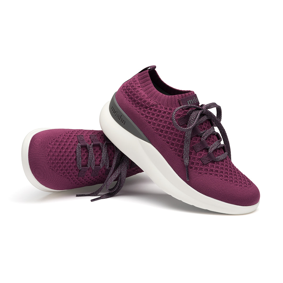 A pair of 21040727_dark purple sneakers with lace-up closure pair view