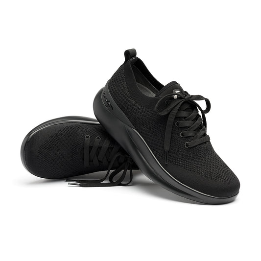 Leap wingtip shoe with a sleek design, featuring a SmartKnit¨ water-resistant upper and Dynamic Motion Technology¨ for stability and propulsion.