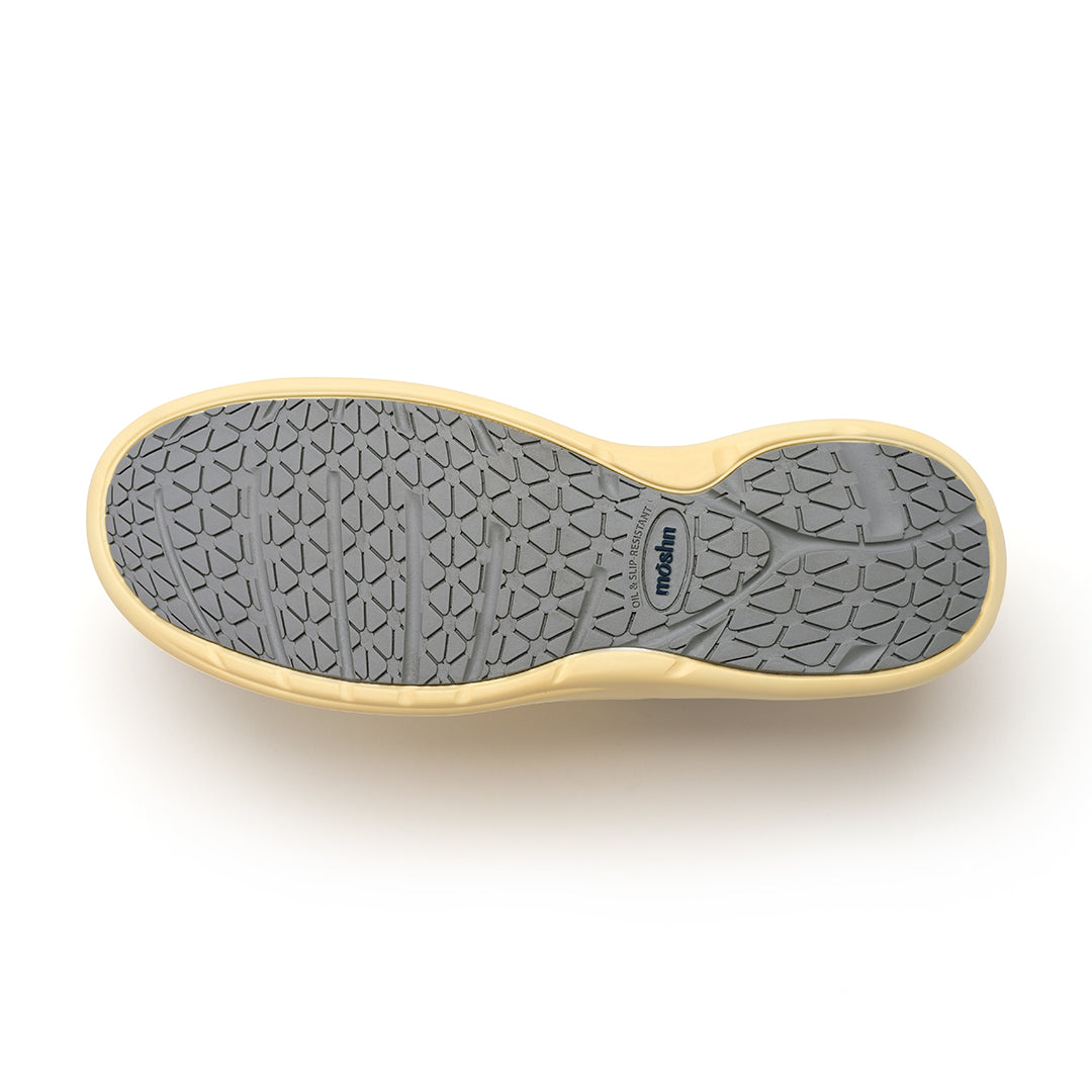 Leap shoe outsole with PURGrip¨ tread for slip-resistant traction, designed for secure footing on slick surfaces.