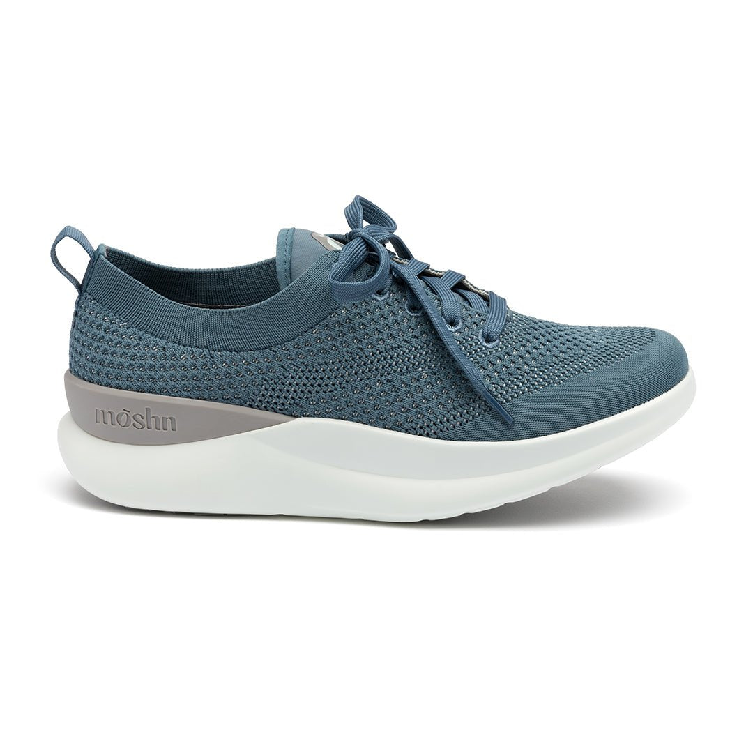 Leap shoe outside view, featuring a stylish wingtip design, slip-resistant PURGrip¨ outsole, and water-resistant SmartKnit¨ upper.