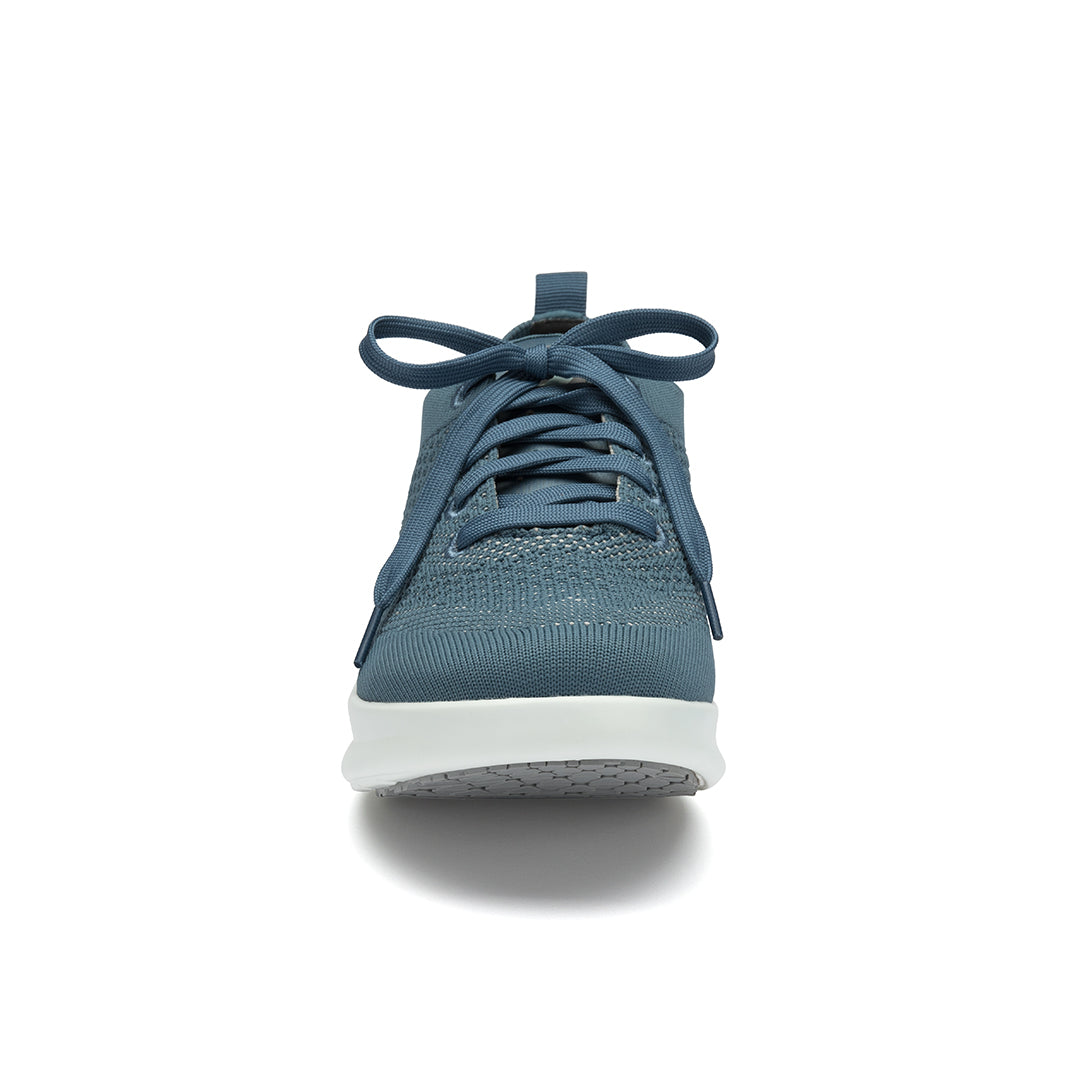 Leap shoe toe close-up, highlighting the enhanced toe spring for natural movement and wingtip detailing for a polished look.