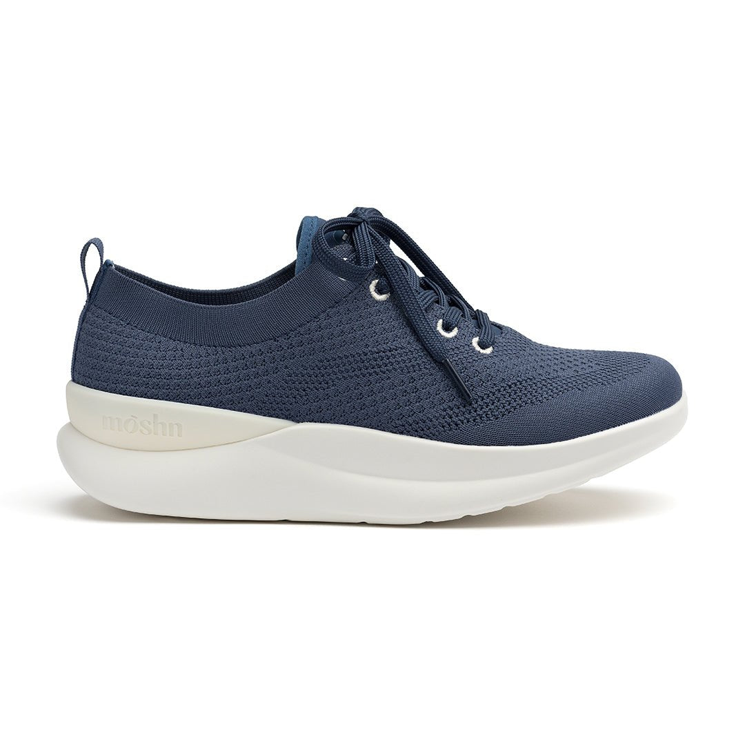 Leap shoe outside view, featuring a stylish wingtip design, slip-resistant PURGrip¨ outsole, and water-resistant SmartKnit¨ upper.