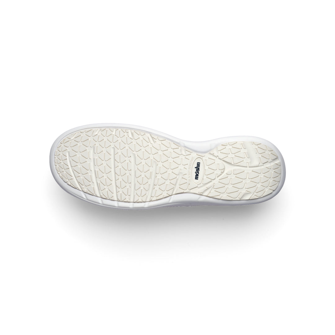 Leap shoe outsole with PURGrip¨ tread for slip-resistant traction, designed for secure footing on slick surfaces.
