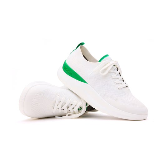 Leap wingtip shoe with a sleek design, featuring a SmartKnit¨ water-resistant upper and Dynamic Motion Technology¨ for stability and propulsion.