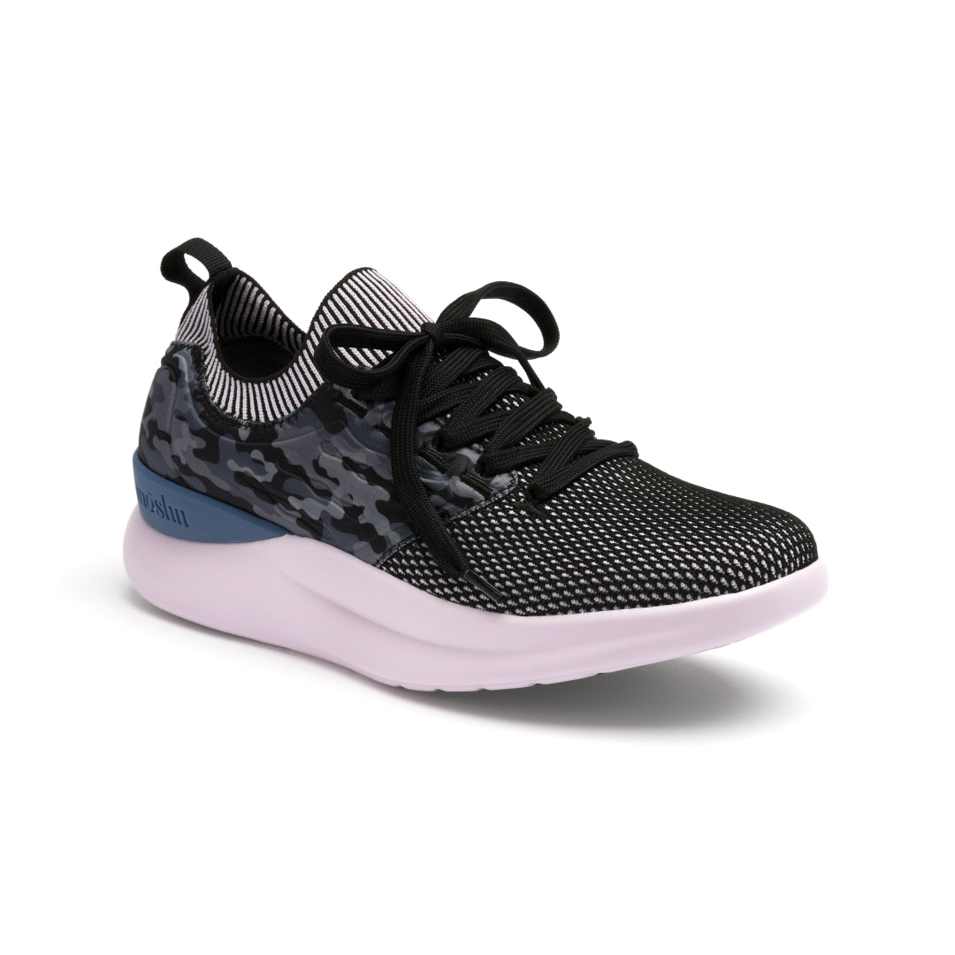 Pulse sneaker at an angled view, showcasing its sleek, versatile design with a breathable SmartKnit¨ upper and Dynamic Motion Technology¨ for stability and propulsion.
