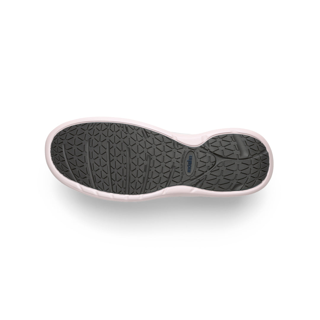 Pulse sneaker outsole close-up, featuring the slip-resistant PURGrip¨ tread for secure footing on various surfaces.