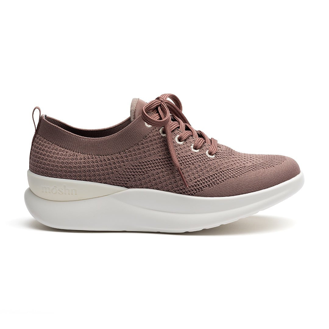 Leap shoe outside view, featuring a stylish wingtip design, slip-resistant PURGrip¨ outsole, and water-resistant SmartKnit¨ upper.