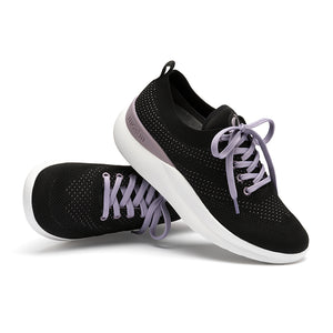 Leap wingtip shoe with a sleek design, featuring a SmartKnit¨ water-resistant upper and Dynamic Motion Technology¨ for stability and propulsion.