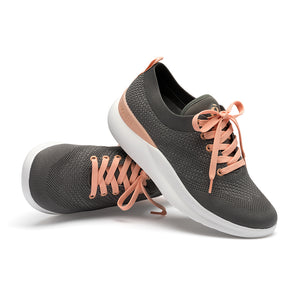 Leap wingtip shoe with a sleek design, featuring a SmartKnit¨ water-resistant upper and Dynamic Motion Technology¨ for stability and propulsion.