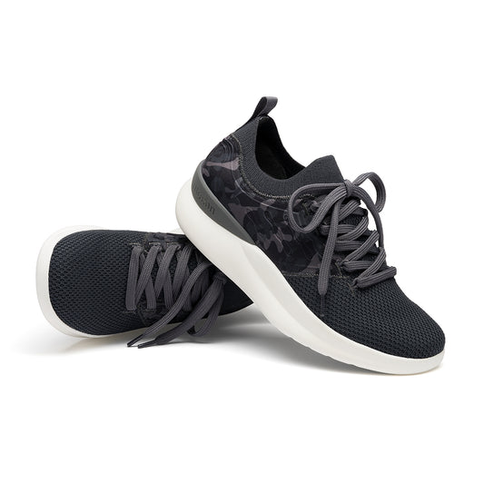 A pair of Pulse sneakers displayed together, showcasing their sleek, versatile design, SmartKnit¨ upper, and slip-resistant PURGrip¨ outsole.