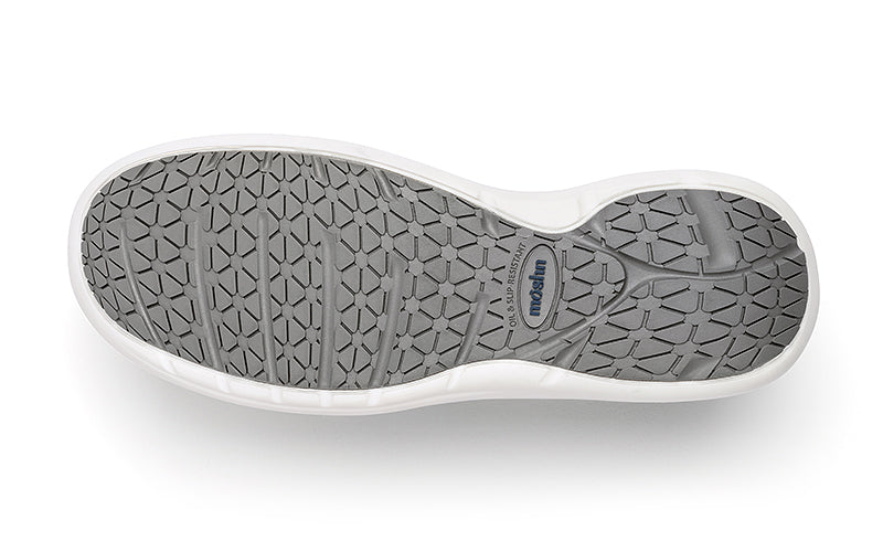 Pulse sneaker outsole close-up, featuring the slip-resistant PURGrip¨ tread for secure footing on various surfaces.